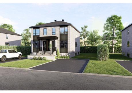 Dom na sprzedaż - 897 Av. du Bourg-Royal, Charlesbourg, QC G2L1X1, CA Charlesbourg, Kanada, 116 m², 251 456 USD (1 023 425 PLN), NET-102992168