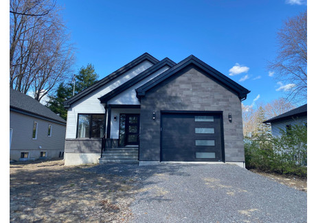 Dom na sprzedaż - 19 20e Avenue, Sainte-Marthe-sur-le-Lac, QC J0N1P0, CA Sainte-Marthe-Sur-Le-Lac, Kanada, 140 m², 494 467 USD (1 903 699 PLN), NET-96821413