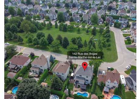 Dom na sprzedaż - 142 Rue des Anges, Sainte-Marthe-sur-le-Lac, QC J0N1P0, CA Sainte-Marthe-Sur-Le-Lac, Kanada, 198 m², 618 390 USD (2 393 167 PLN), NET-99974767